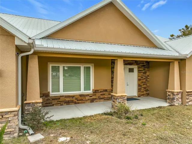 a view of a house with a outdoor space