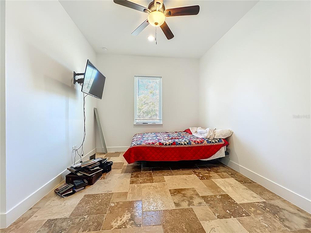 540 Northwest 165th Ct Road Dunnellon, FL 34432 - Photo 61 of 85 a bedroom with a bed and window