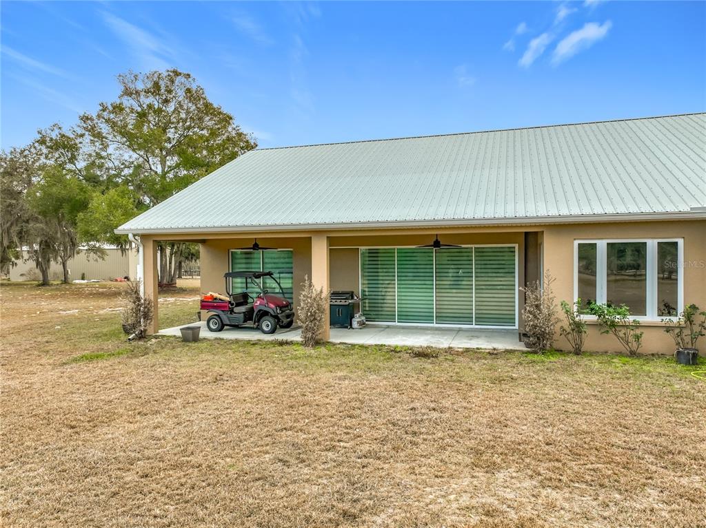 540 Northwest 165th Ct Road Dunnellon, FL 34432 - Photo 76 of 85 a front view of a house with patio