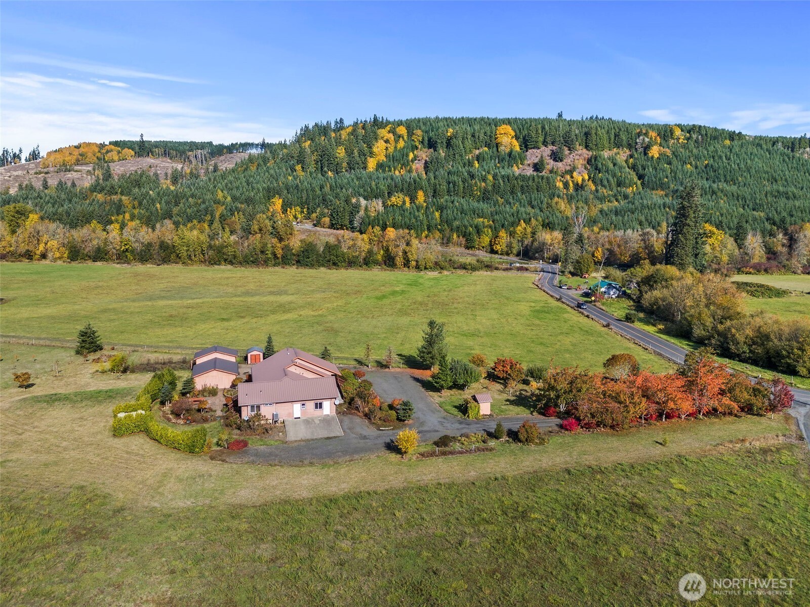 395 Ceres Hill Road Chehalis, WA 98532 - Photo 32 of 40 a front view of a house with a garden and ocean view