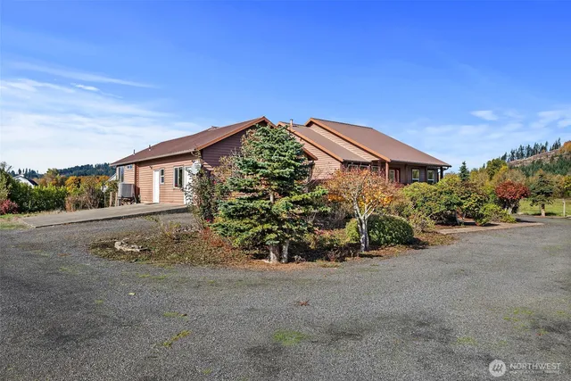 front view of a house with a street