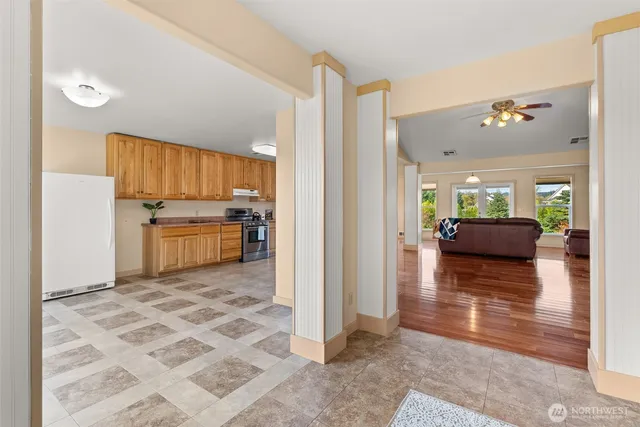 a view of kitchen with livingroom and furniture