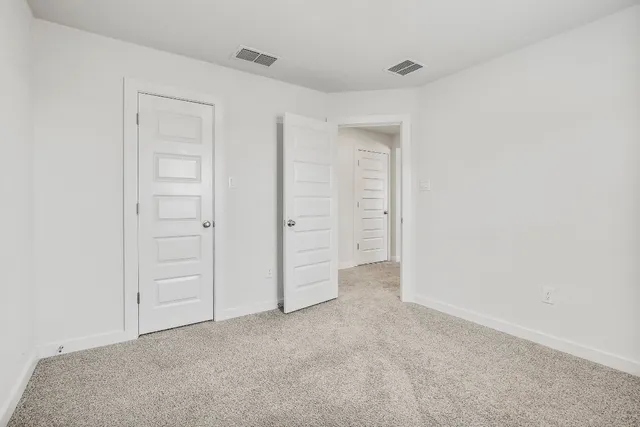 a view of a room that has a window