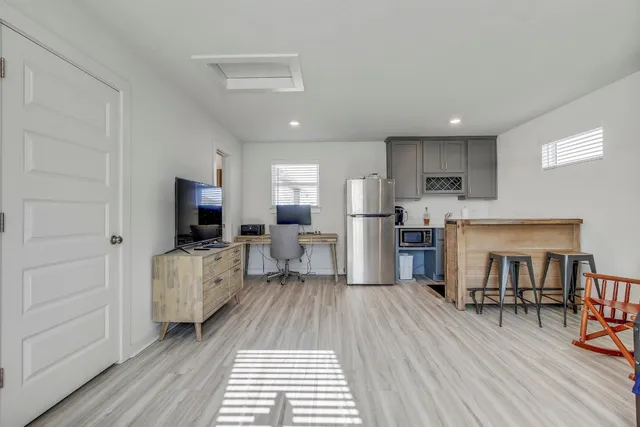 a room with furniture and a window