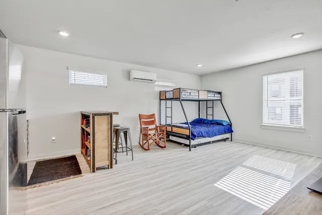 a kitchen with stainless steel appliances a refrigerator and cabinets