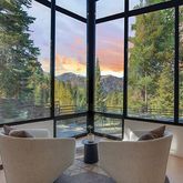 a living room with couch and a window