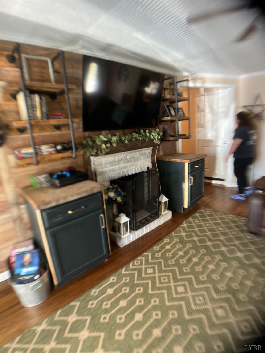 697 Stone Mill Road Hurt, VA 24563 - Photo 4 of 31 a kitchen with a stove and a microwave