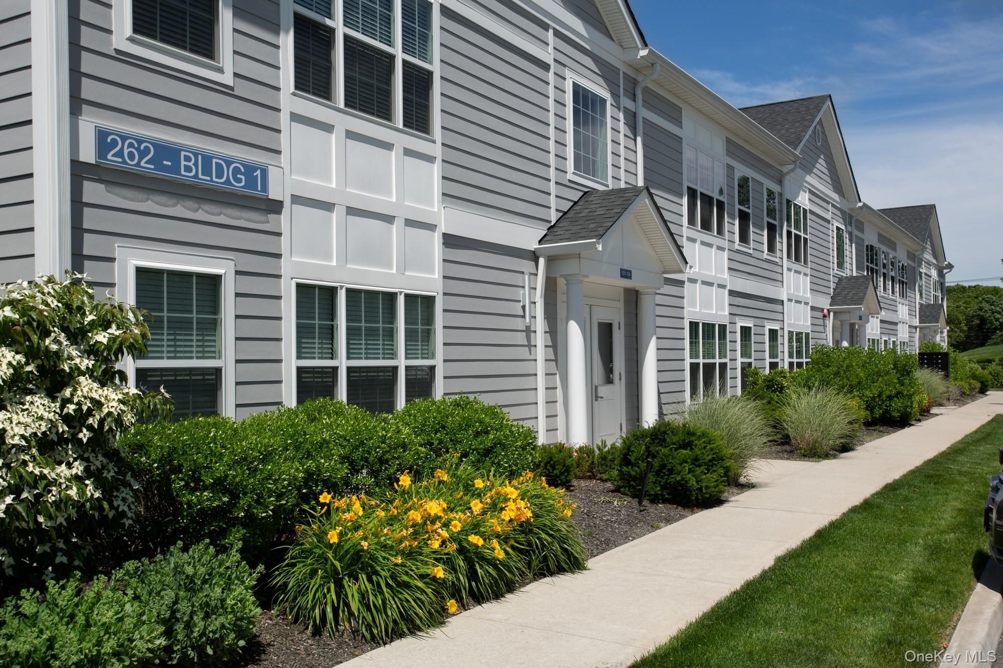 a front view of a multi story residential apartment building