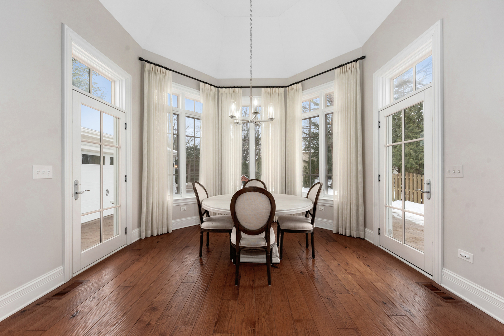 820 Wellner Road Naperville, IL 60540 - Photo 11 of 52 a view of a livingroom with furniture wooden floor and furniture