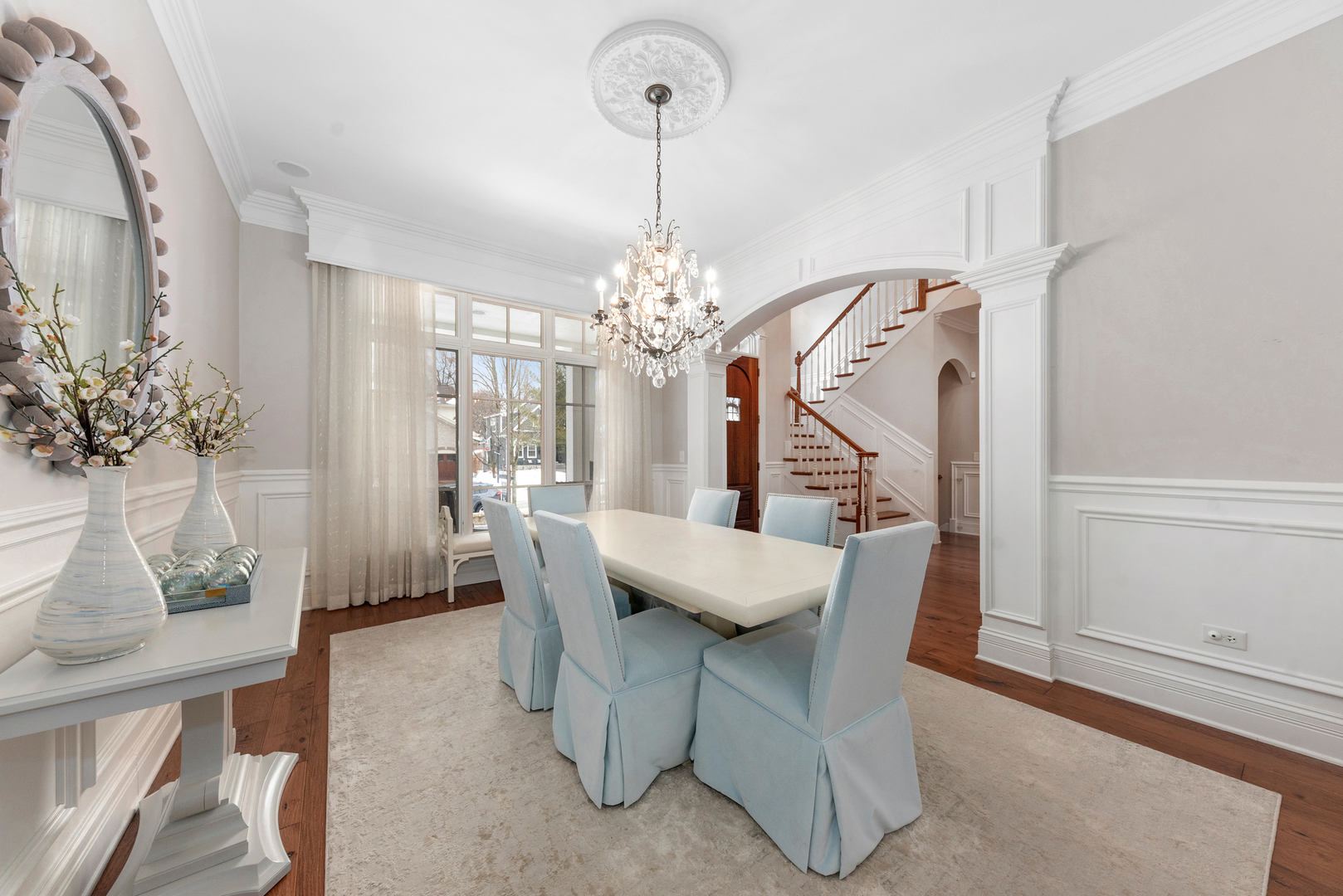 820 Wellner Road Naperville, IL 60540 - Photo 13 of 52 a view of a dining room with furniture and chandelier