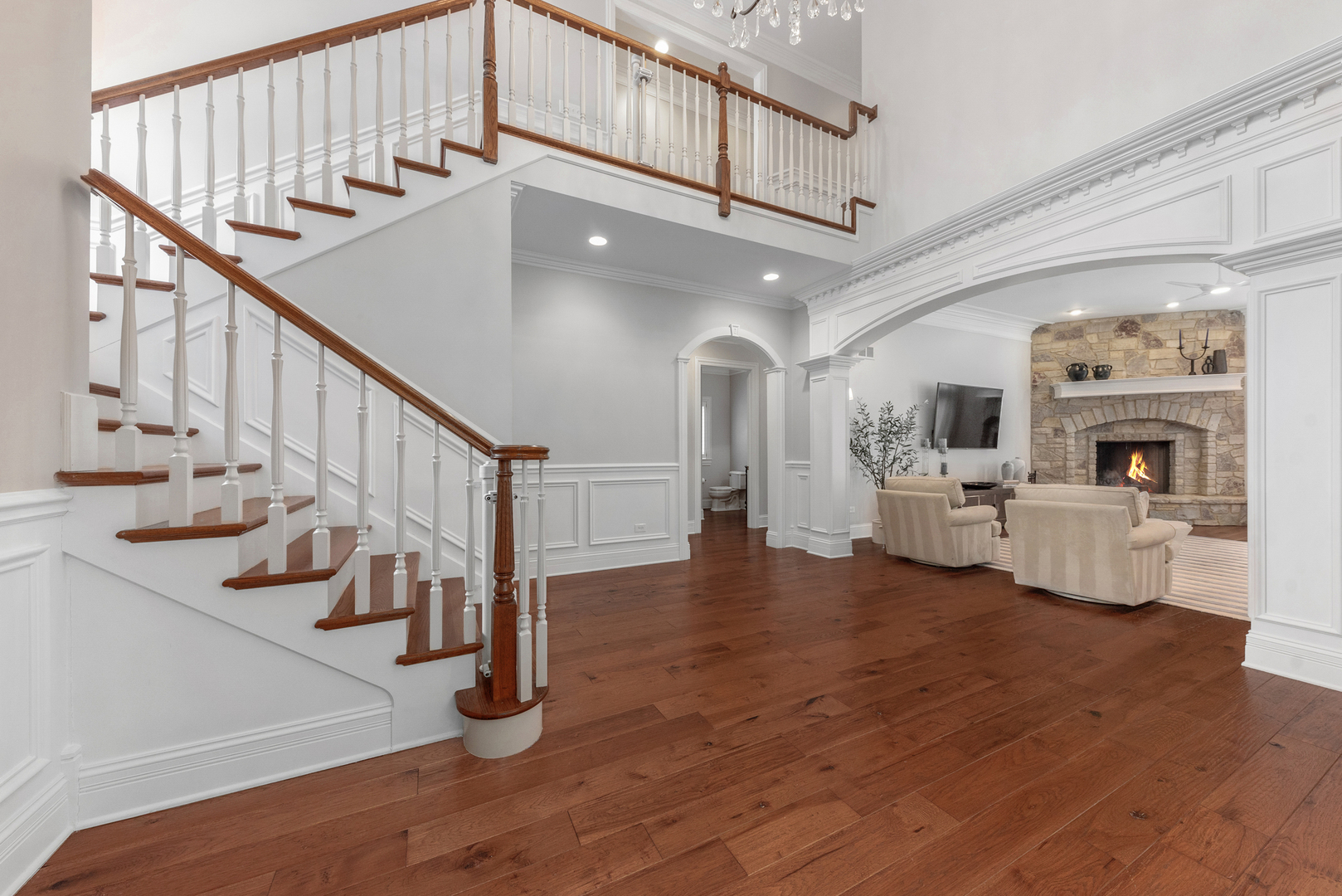 820 Wellner Road Naperville, IL 60540 - Photo 2 of 52 a view of entryway and hall with wooden floor