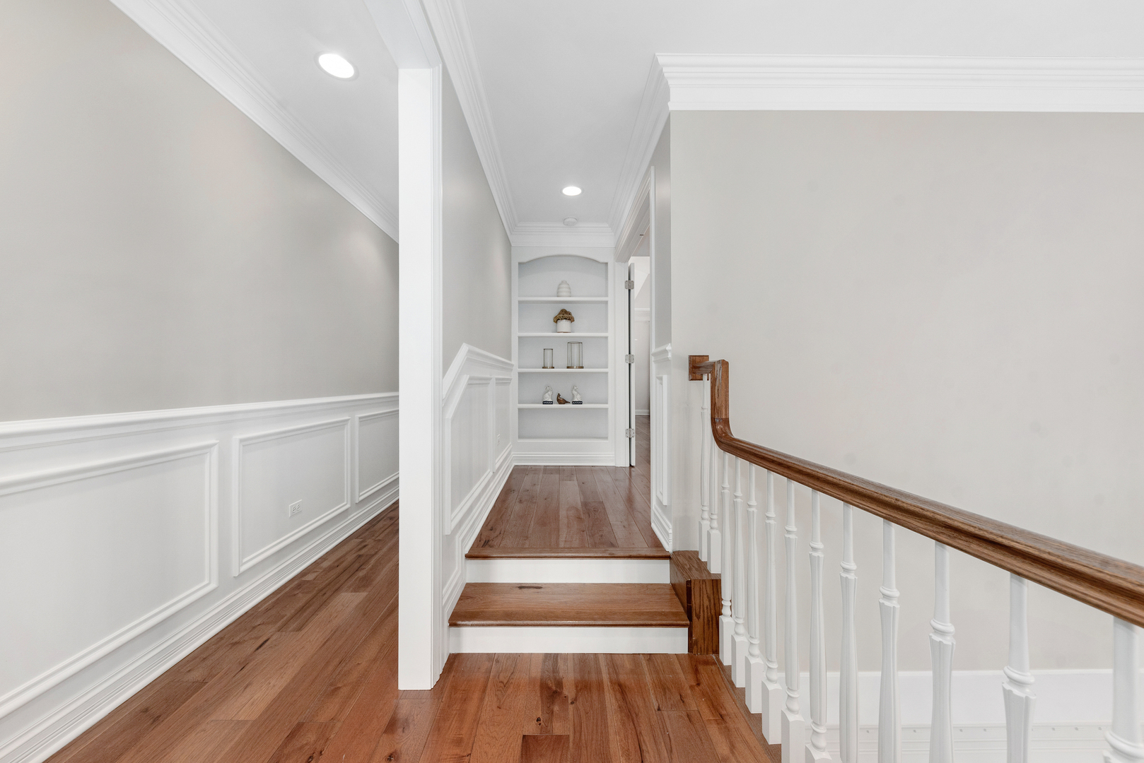 820 Wellner Road Naperville, IL 60540 - Photo 25 of 52 a view of gallery with wooden floor and stairs