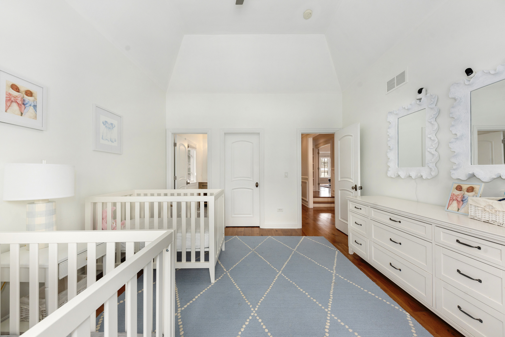 820 Wellner Road Naperville, IL 60540 - Photo 32 of 52 a bedroom with furniture and baby crib