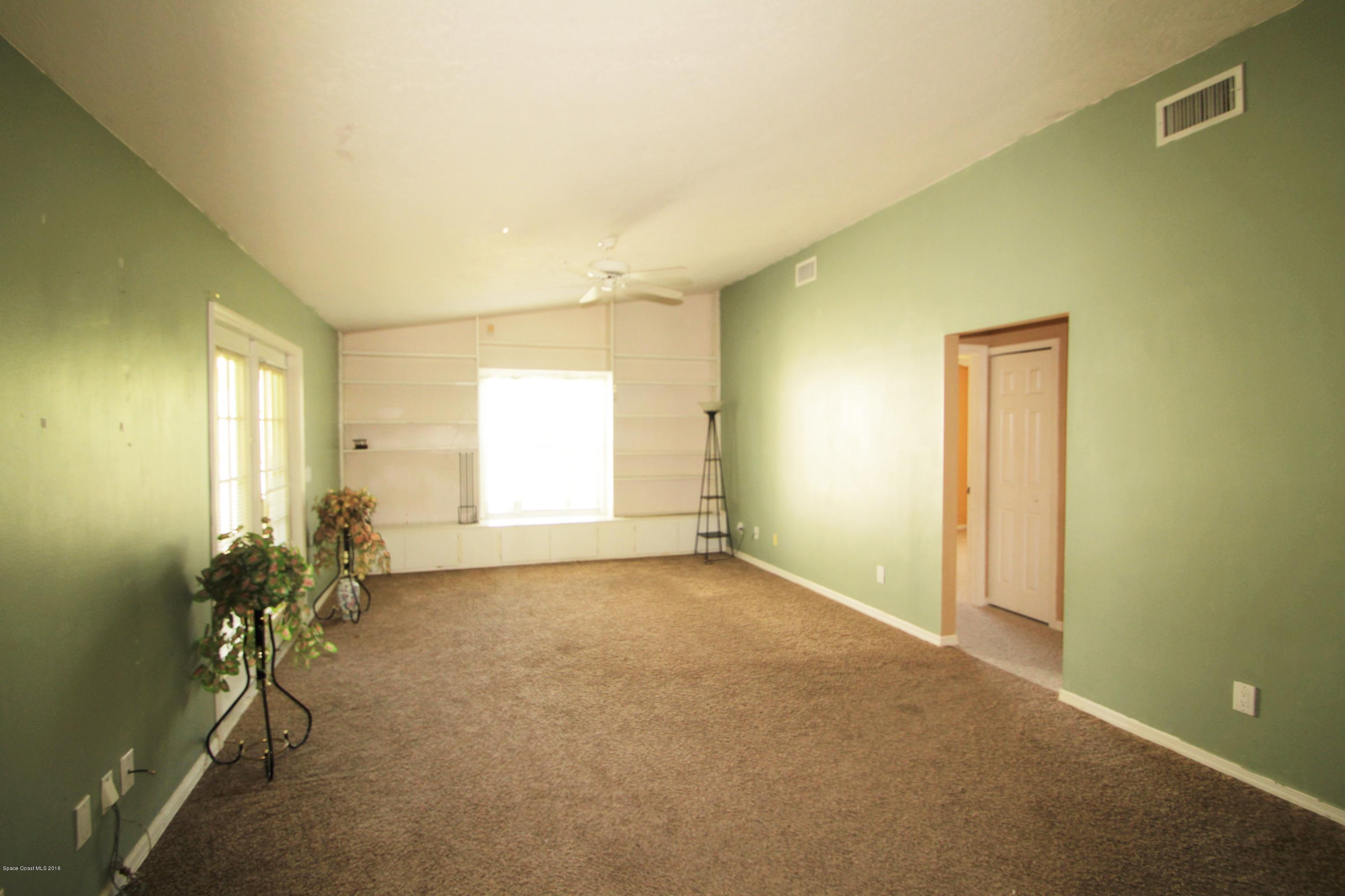 1011 Tide Road Southeast Palm Bay, FL 32909 - Photo 10 of 26 Family room