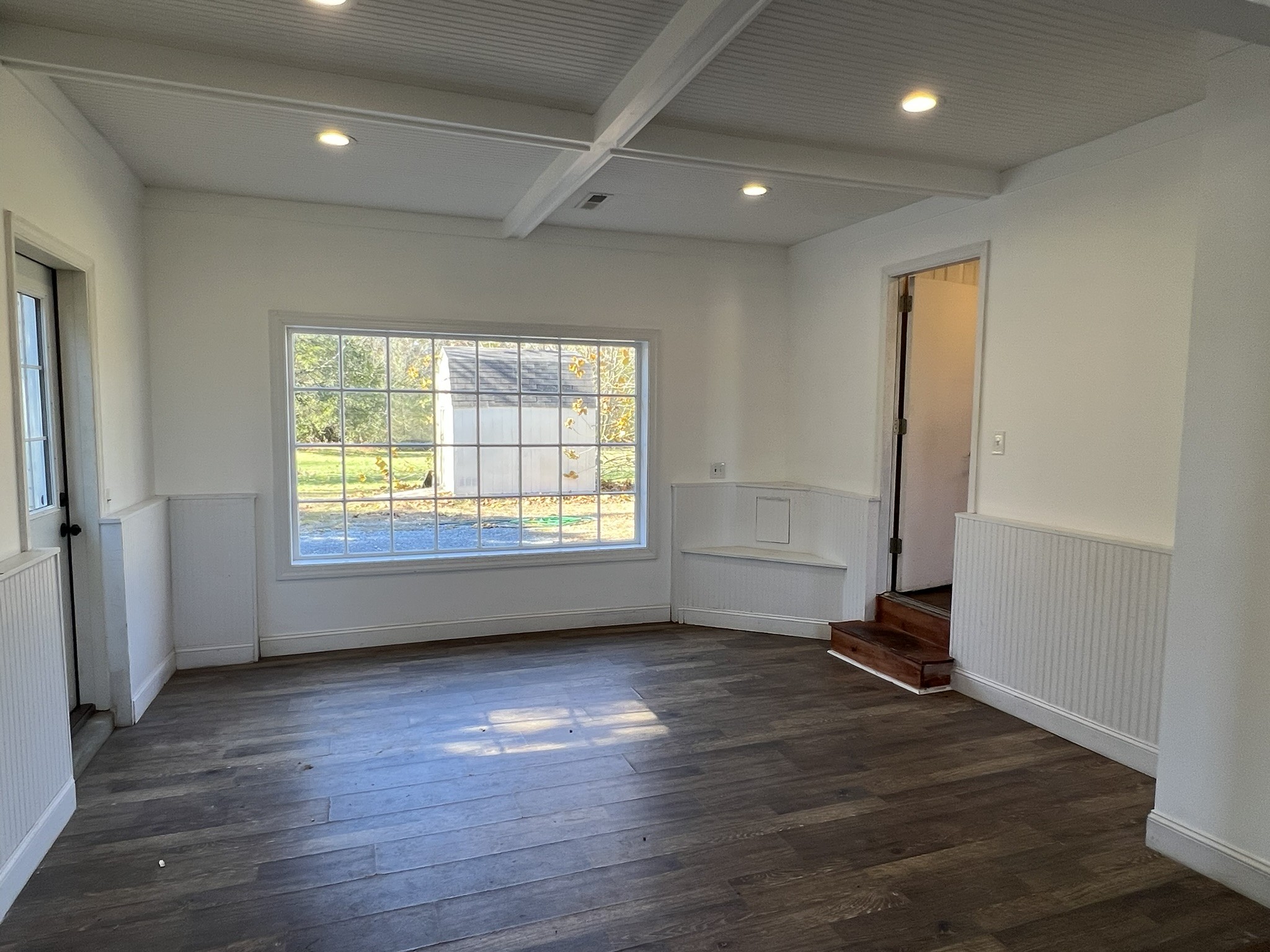 7155 Nolensville Road Nolensville, TN 37135 - Photo 11 of 24 an empty room with wooden floor and windows