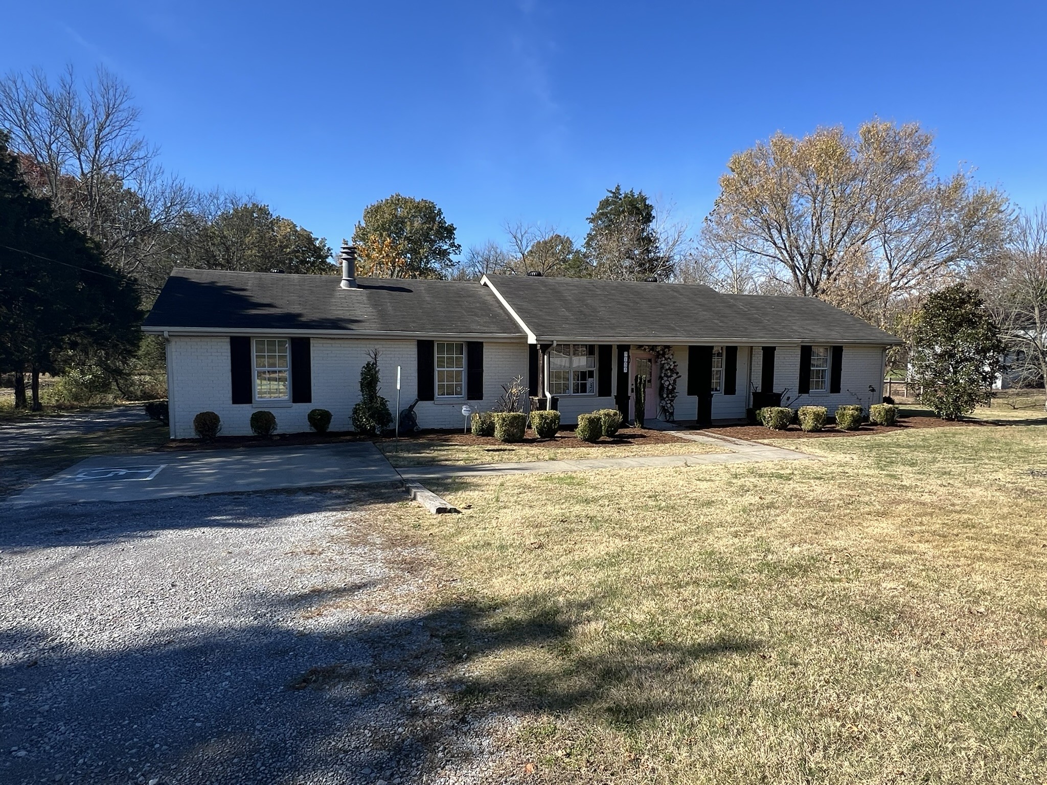 7155 Nolensville Road Nolensville, TN 37135 - Photo 2 of 24 a front view of a house with a yard