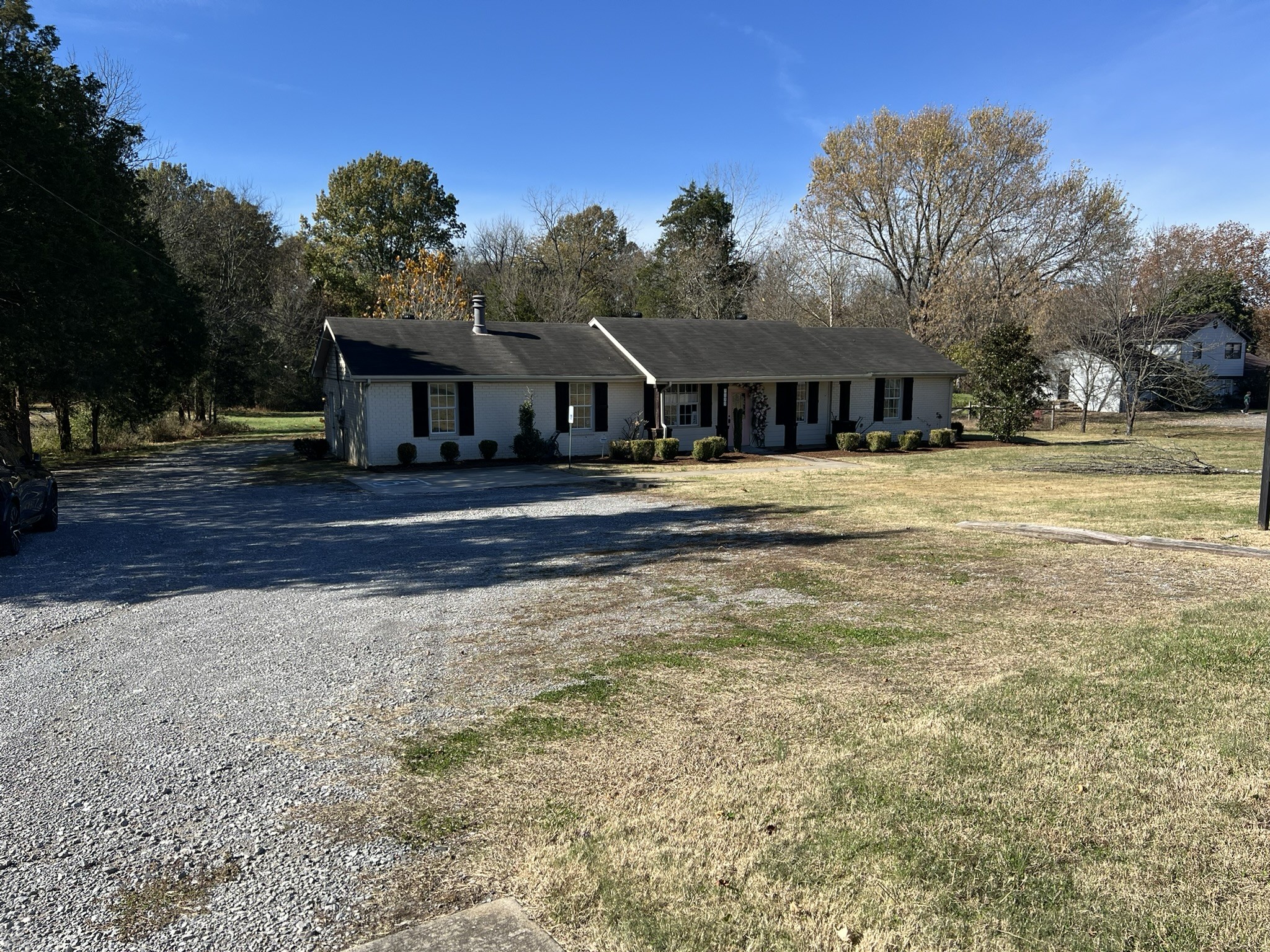 7155 Nolensville Road Nolensville, TN 37135 - Photo 24 of 24 a front view of house with yard and trees in the background