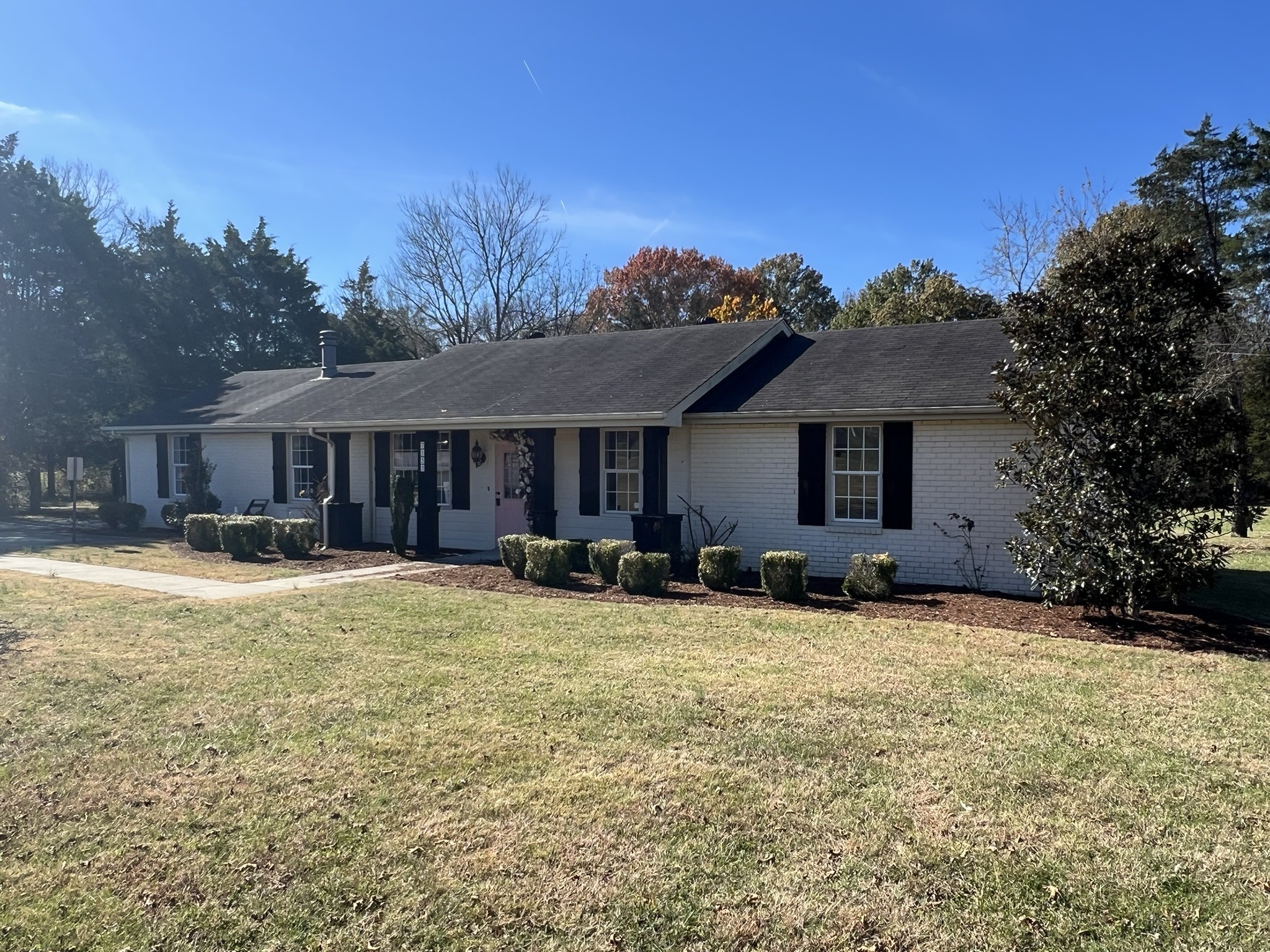 7155 Nolensville Road Nolensville, TN 37135 - Photo 3 of 24 a view of a house with a yard patio and fire pit