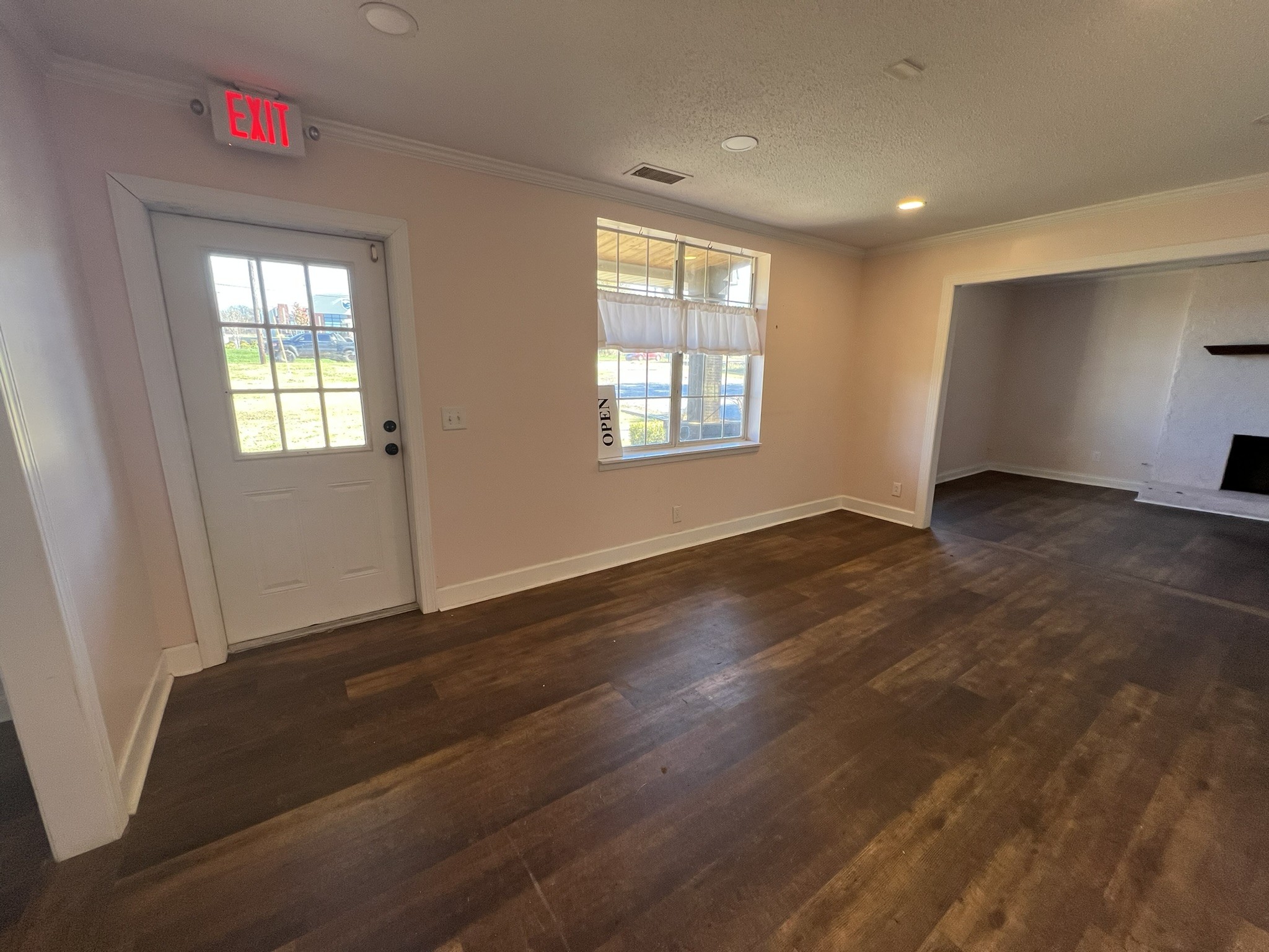7155 Nolensville Road Nolensville, TN 37135 - Photo 7 of 24 an empty room with wooden floor and windows