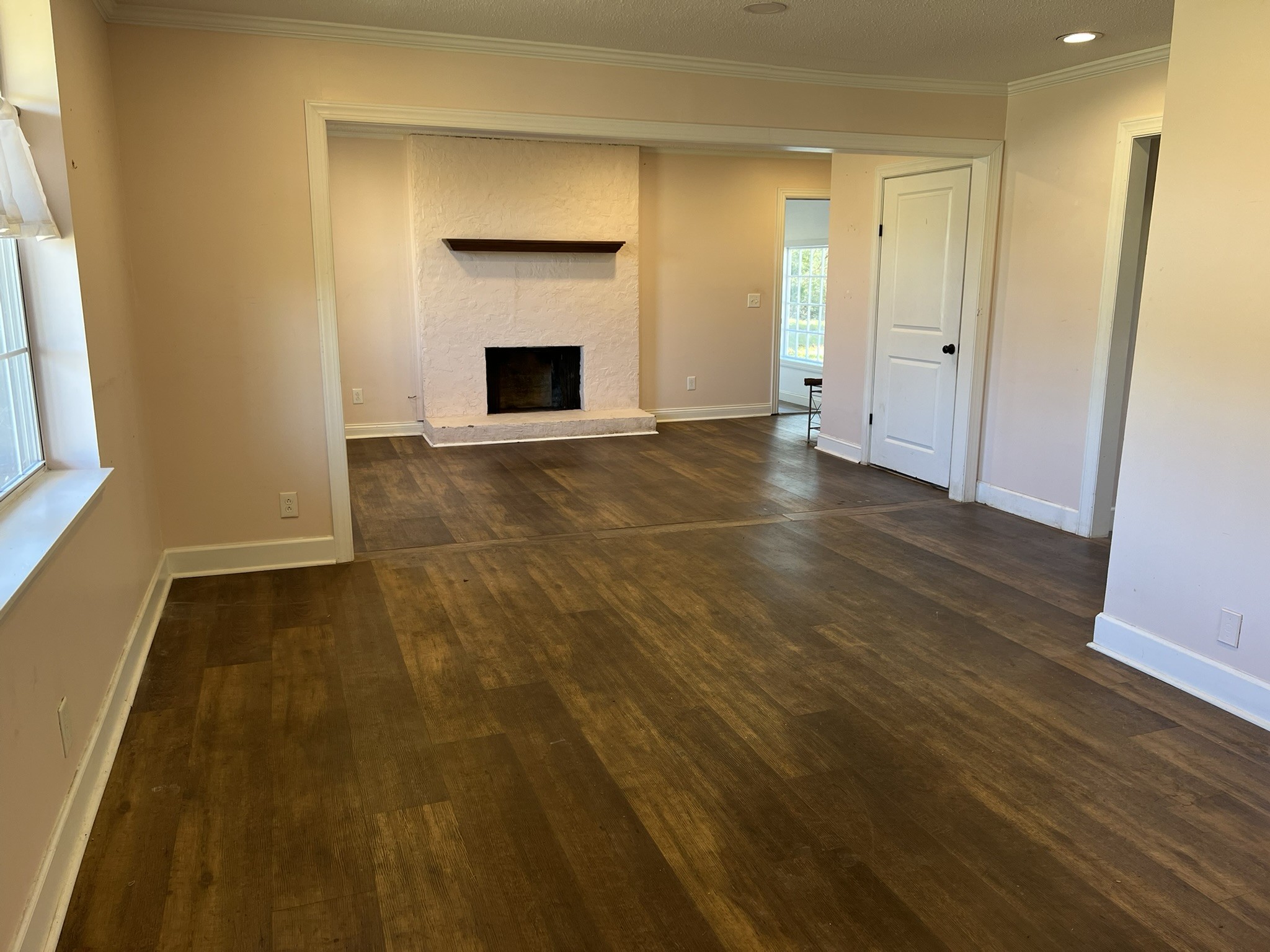 7155 Nolensville Road Nolensville, TN 37135 - Photo 8 of 24 a view of an empty room with wooden floor and a window