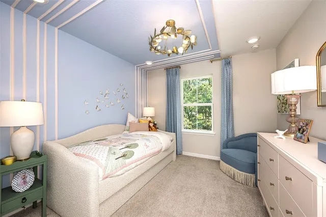 a bed room with a bed and a window