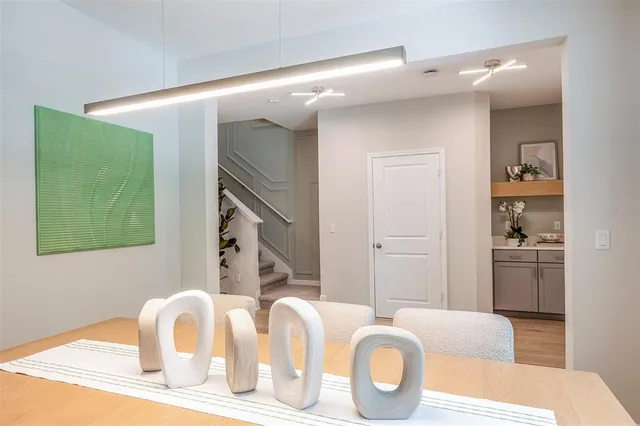 a bathroom with a tub and a mirror