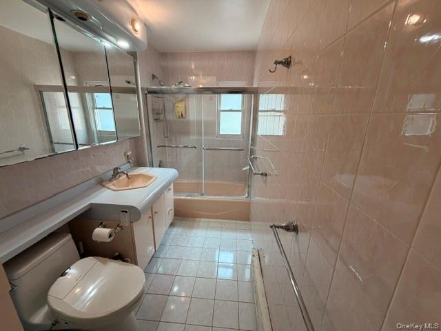 150-06 78th Road Queens, NY 11367 - Photo 12 of 22 a bathroom with a sink a toilet and shower