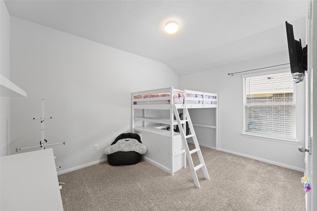 9020 Ridgeriver Way Fort Worth, TX 76131 - Photo 19 of 26 a view of a room with gym equipment