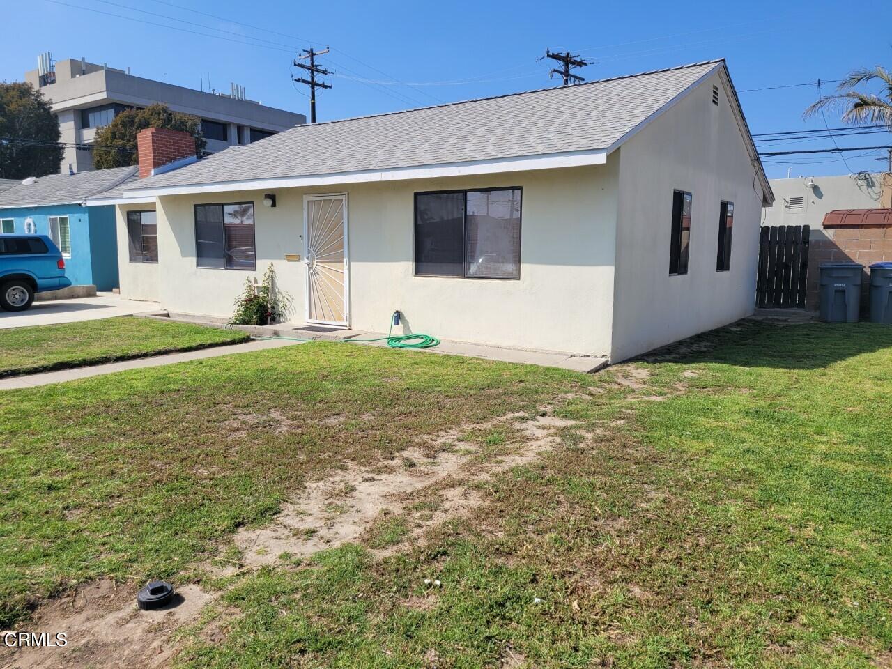 119 Lark Street Oxnard, CA 93033 - Photo 2 of 14 a big house with a big yard and more windows