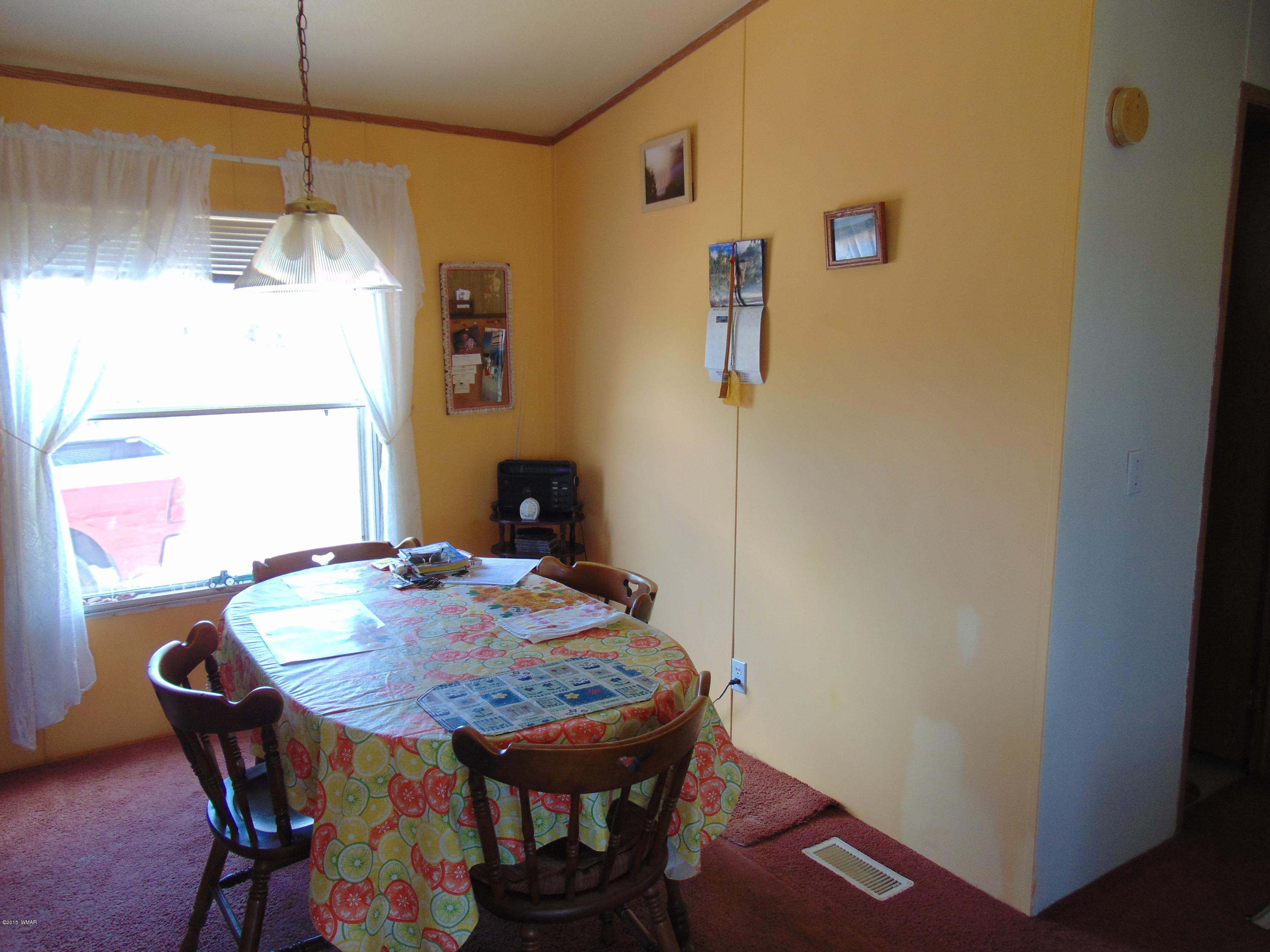 4389 Mountain View Road Snowflake, AZ 85937 - Photo 66 of 82 a dining room with a table and chairs