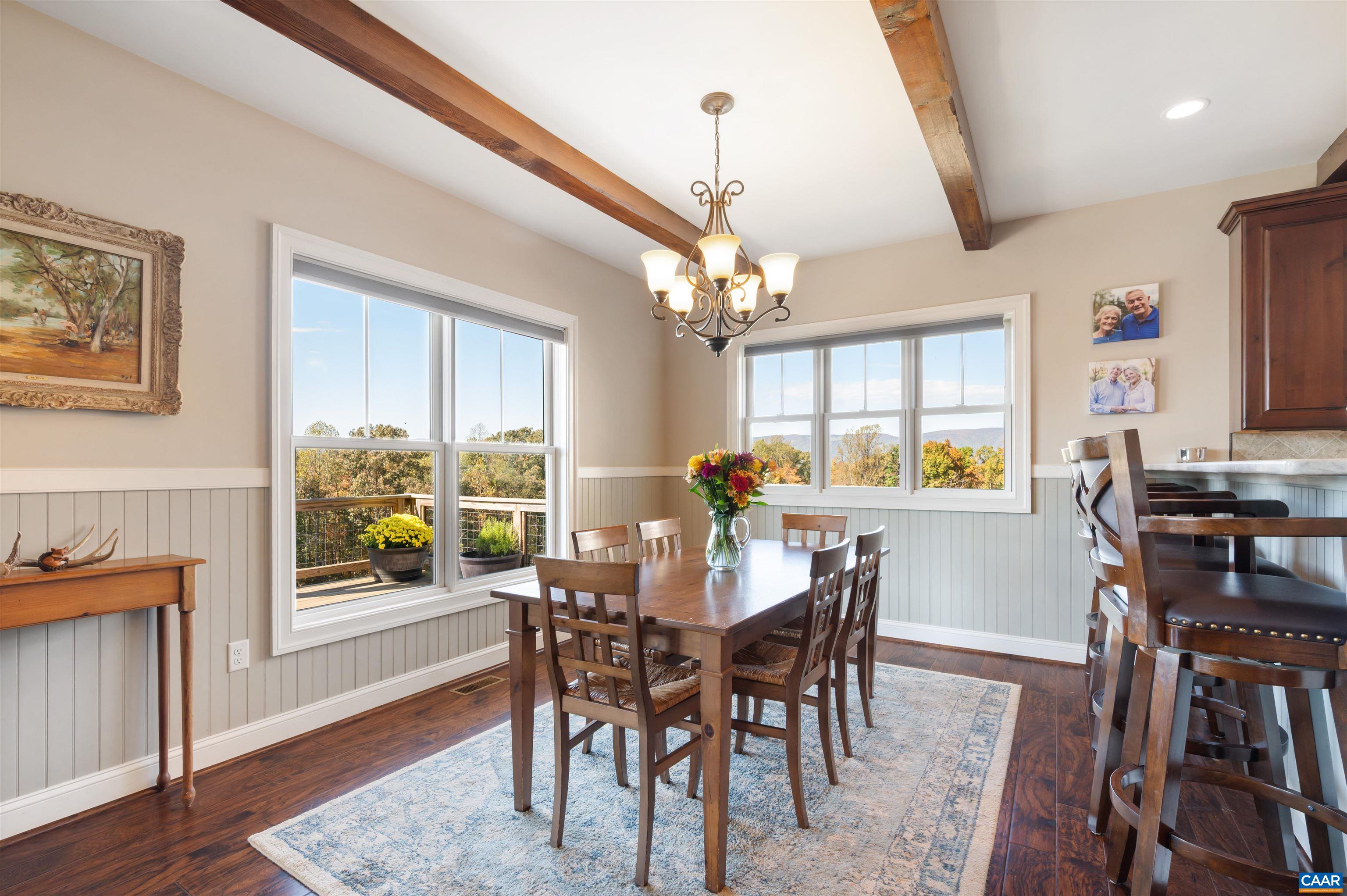 2236 Craigs Store Road Afton, VA 22920 - Photo 15 of 75 a view of a dining room with furniture window and wooden floor