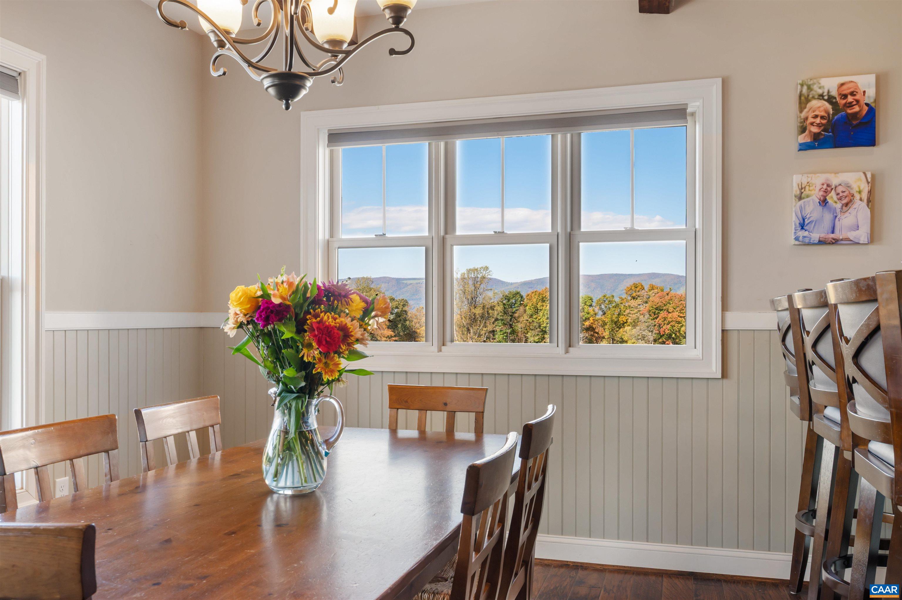 2236 Craigs Store Road Afton, VA 22920 - Photo 17 of 75 a view of a dining room with furniture window and wooden floor