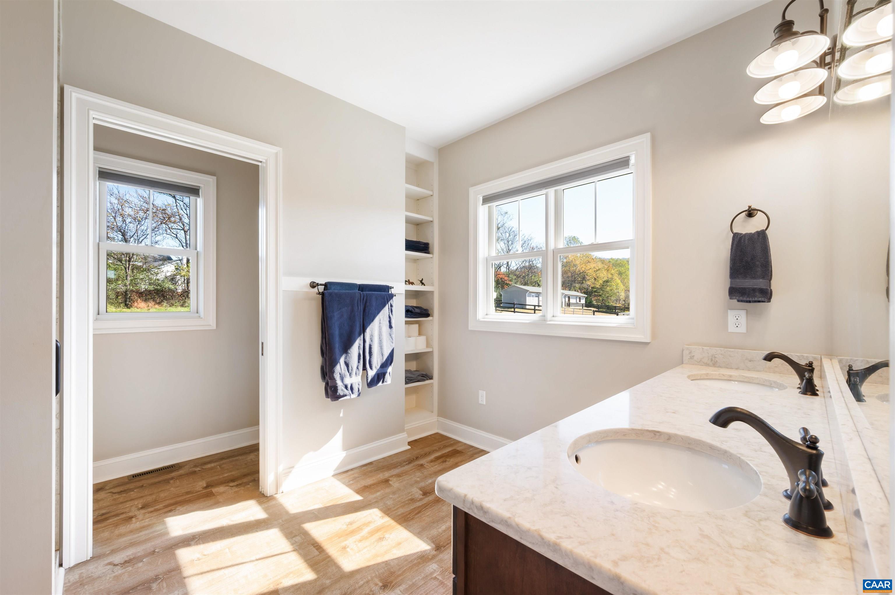 2236 Craigs Store Road Afton, VA 22920 - Photo 25 of 75 a bathroom with a tub sink and mirror