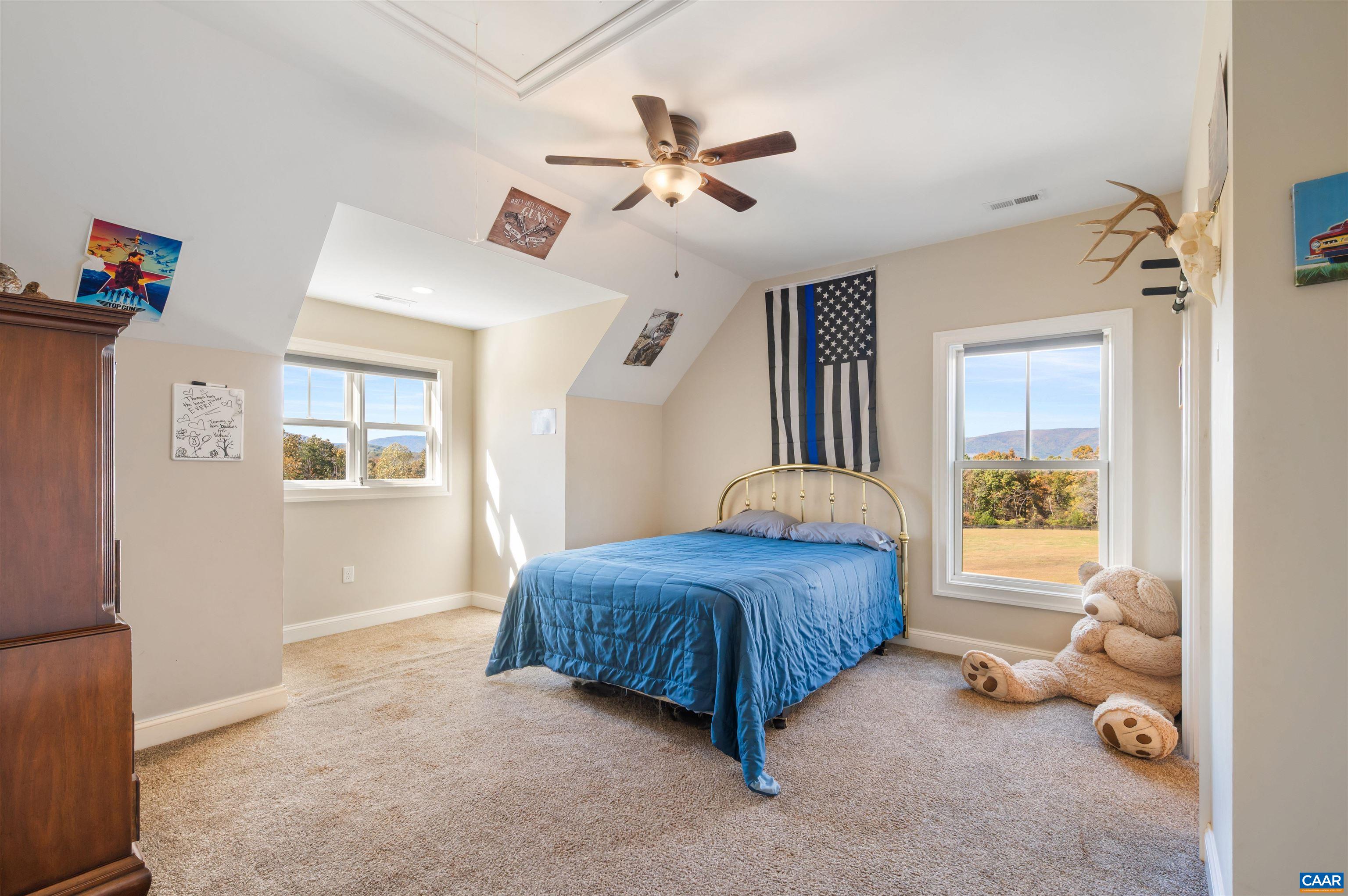 2236 Craigs Store Road Afton, VA 22920 - Photo 31 of 75 a bedroom with a bed and a window