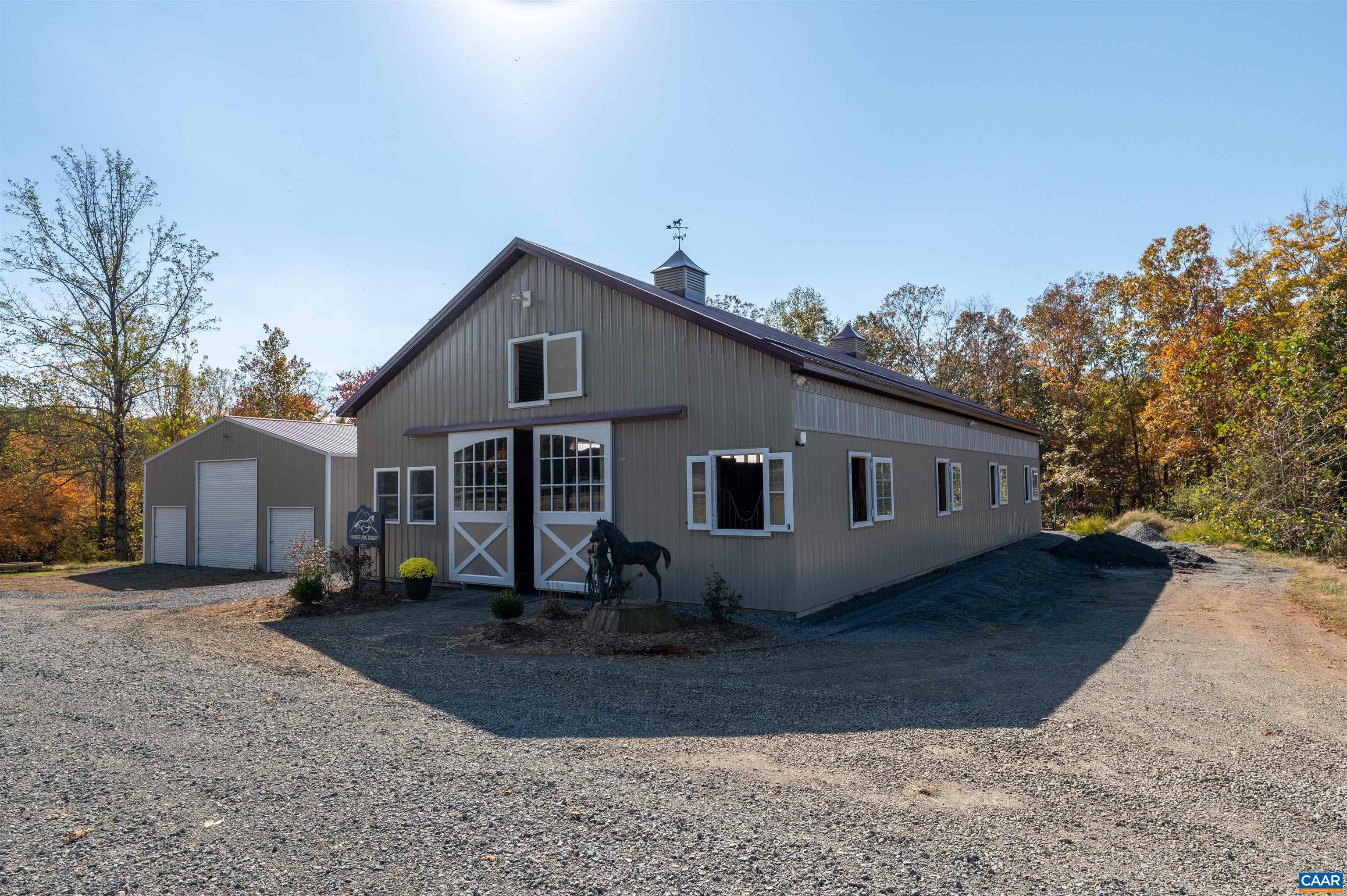 2236 Craigs Store Road Afton, VA 22920 - Photo 47 of 75 a front view of house with yard and trees in the background