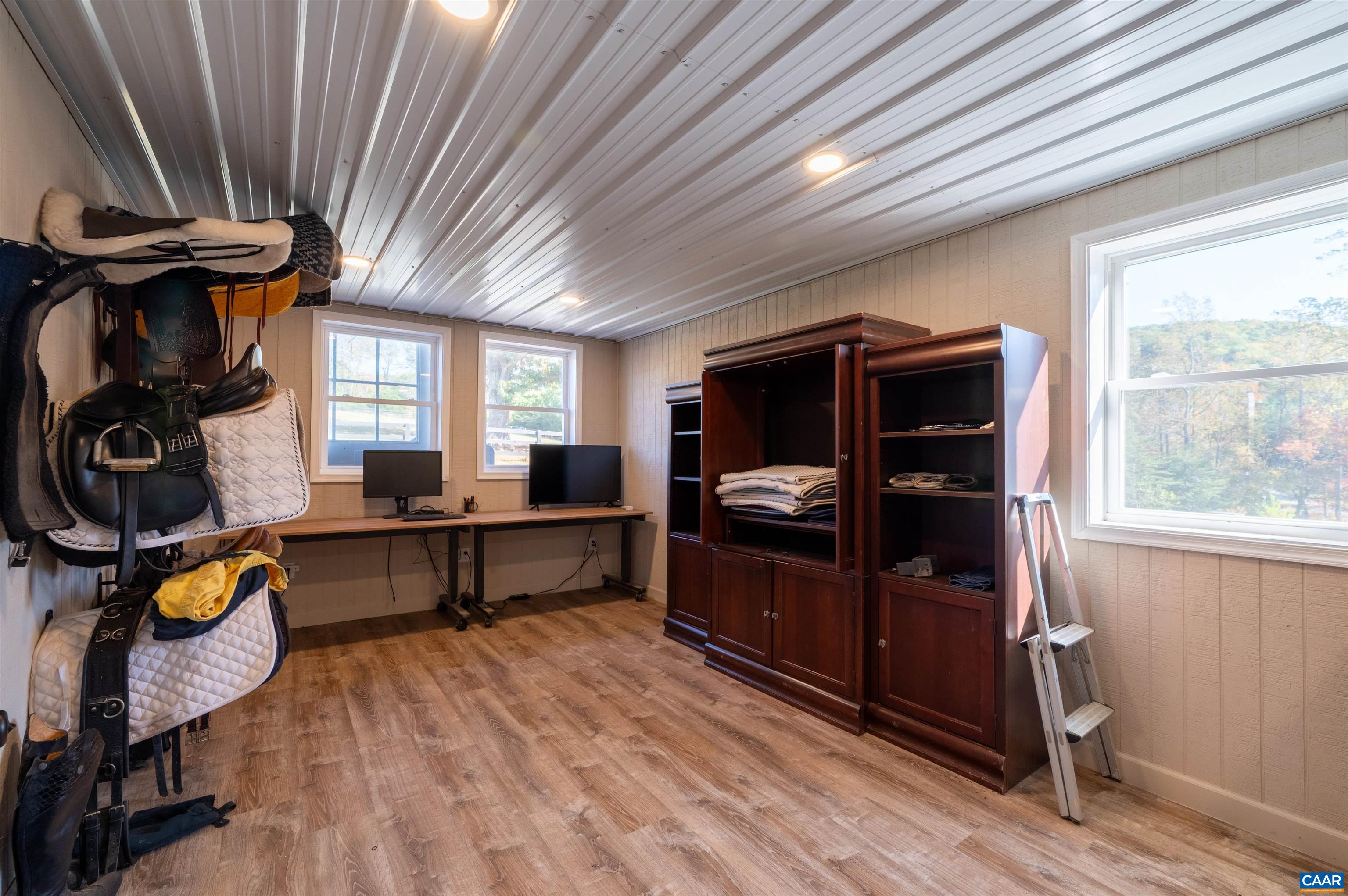 2236 Craigs Store Road Afton, VA 22920 - Photo 51 of 75 a view of a workspace with furniture and windows