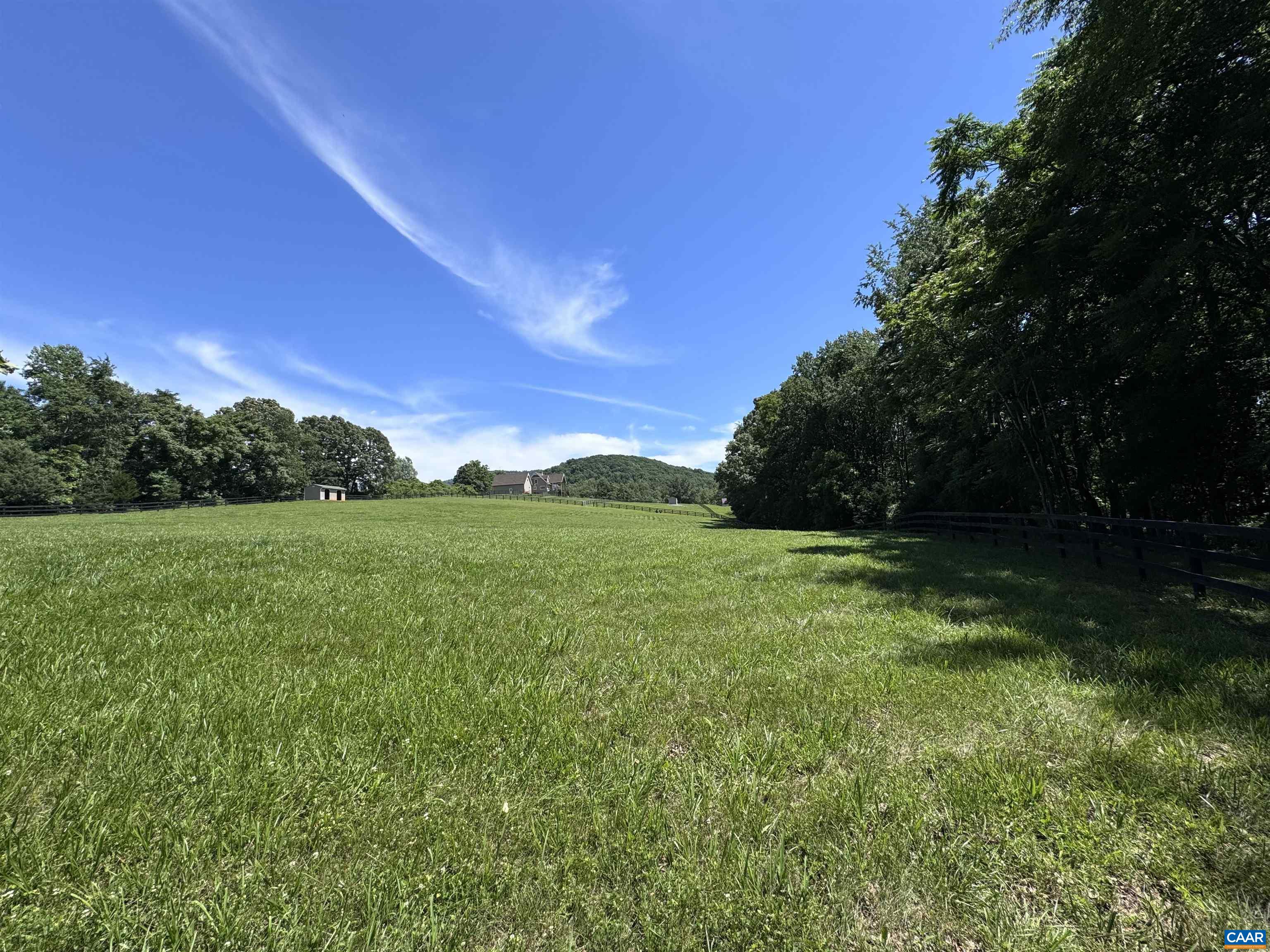 2236 Craigs Store Road Afton, VA 22920 - Photo 66 of 75 a view of a green field with wooden fence