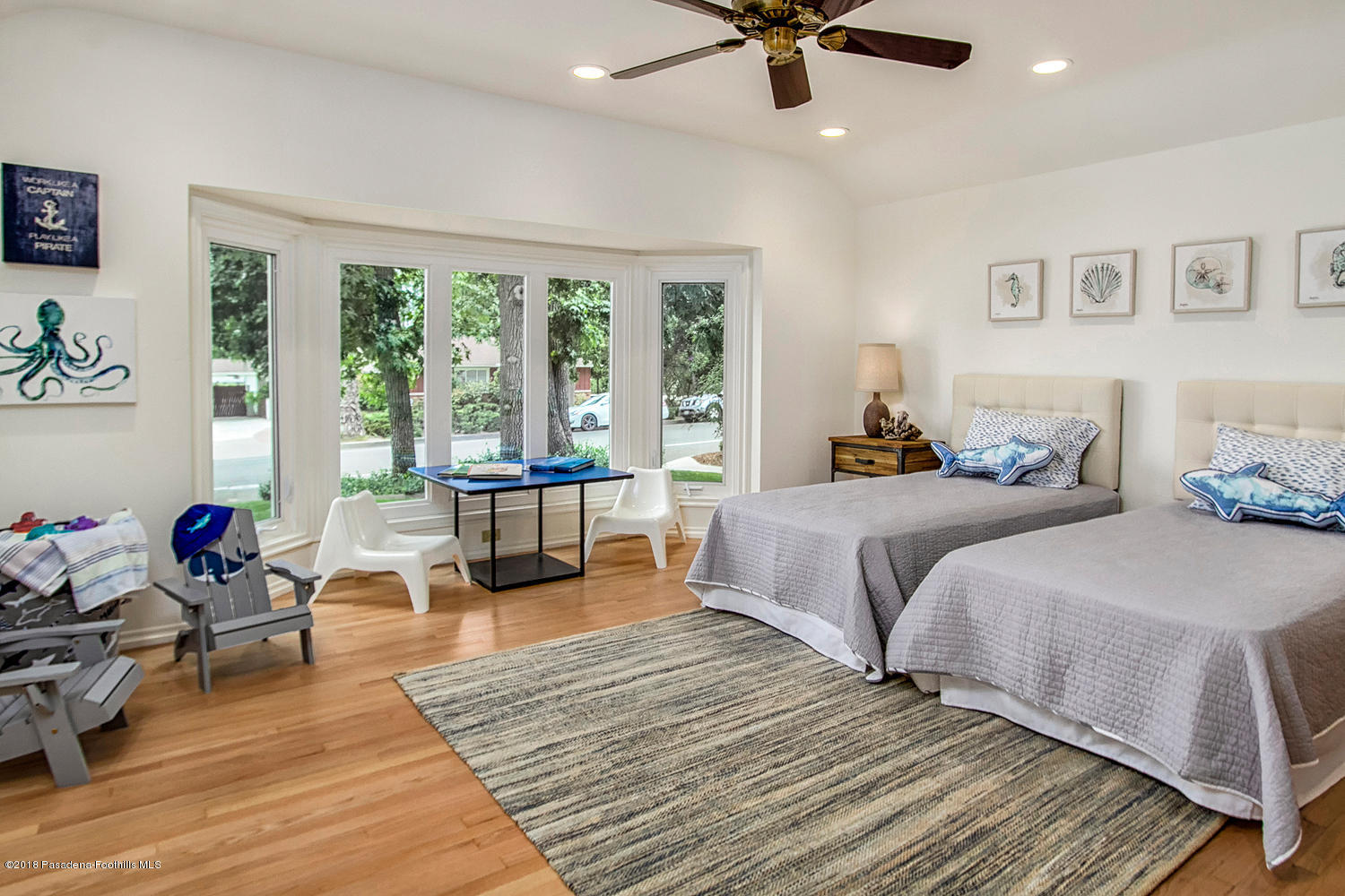 3675 Greenhill Road Pasadena, CA 91107 - Photo 11 of 27 a bedroom with a bed and wooden floor