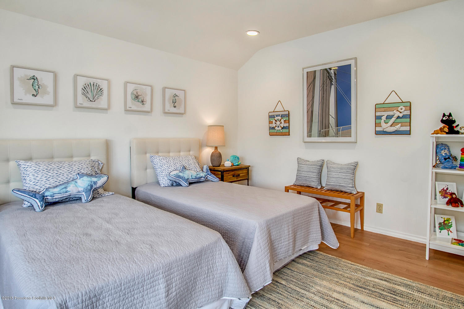 3675 Greenhill Road Pasadena, CA 91107 - Photo 12 of 27 a bedroom with a bed and wooden floor