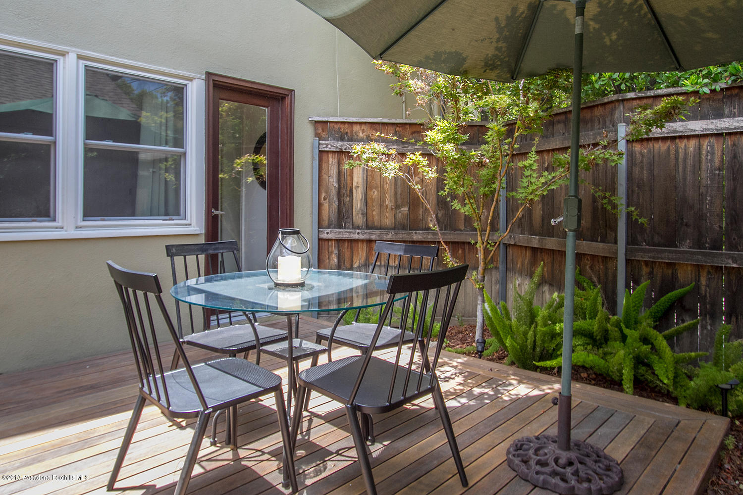 3675 Greenhill Road Pasadena, CA 91107 - Photo 19 of 27 a view of an outdoor sitting area with furniture