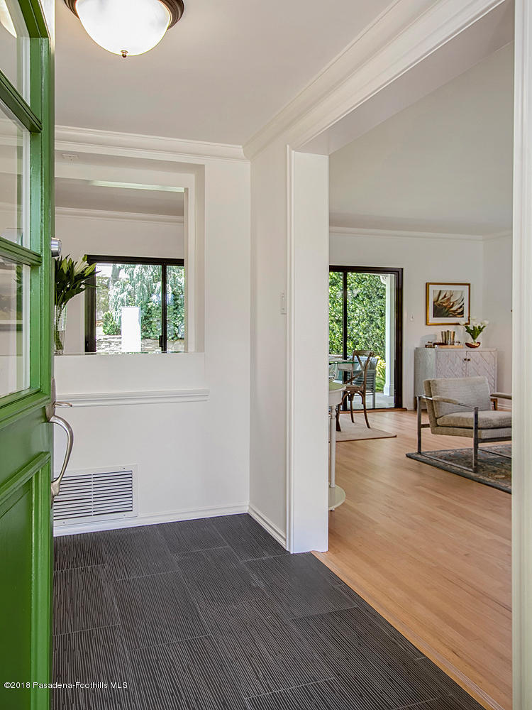 3675 Greenhill Road Pasadena, CA 91107 - Photo 3 of 27 a view of an entryway with wooden floor and windows