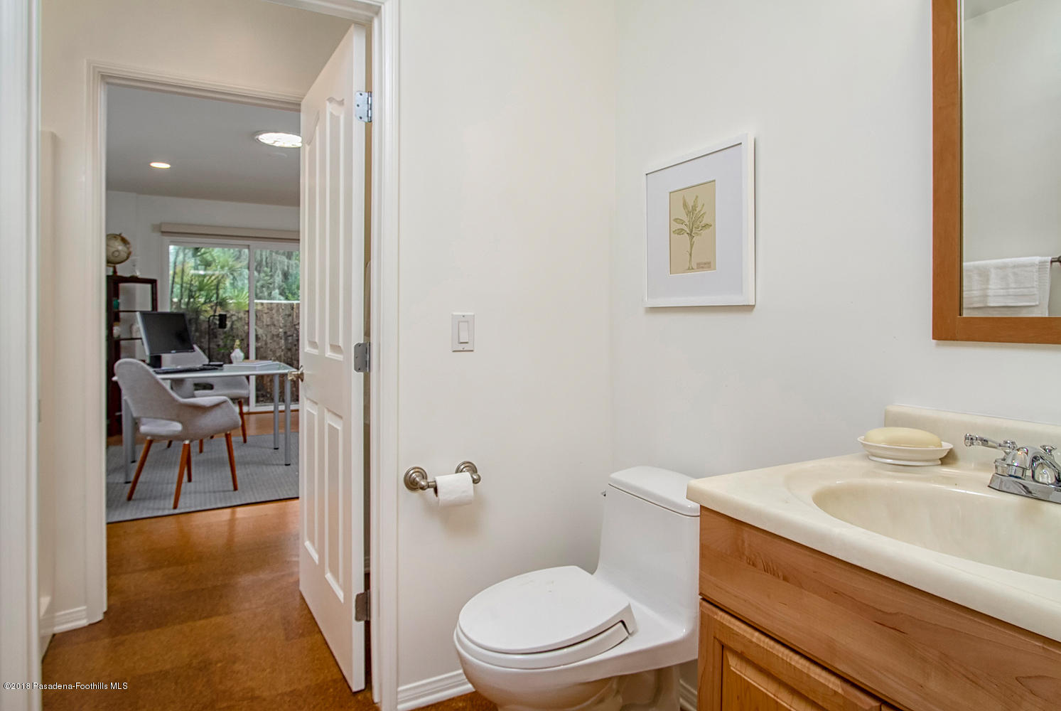 3675 Greenhill Road Pasadena, CA 91107 - Photo 23 of 27 a bathroom with a toilet a sink and a mirror