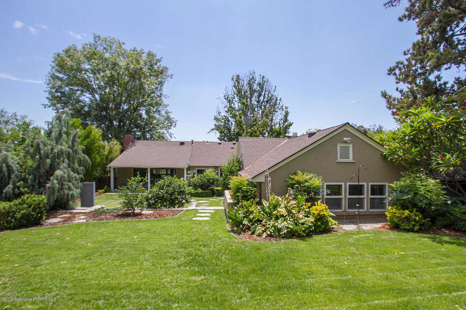 3675 Greenhill Road Pasadena, CA 91107 - Photo 26 of 27 a front view of a house with a yard