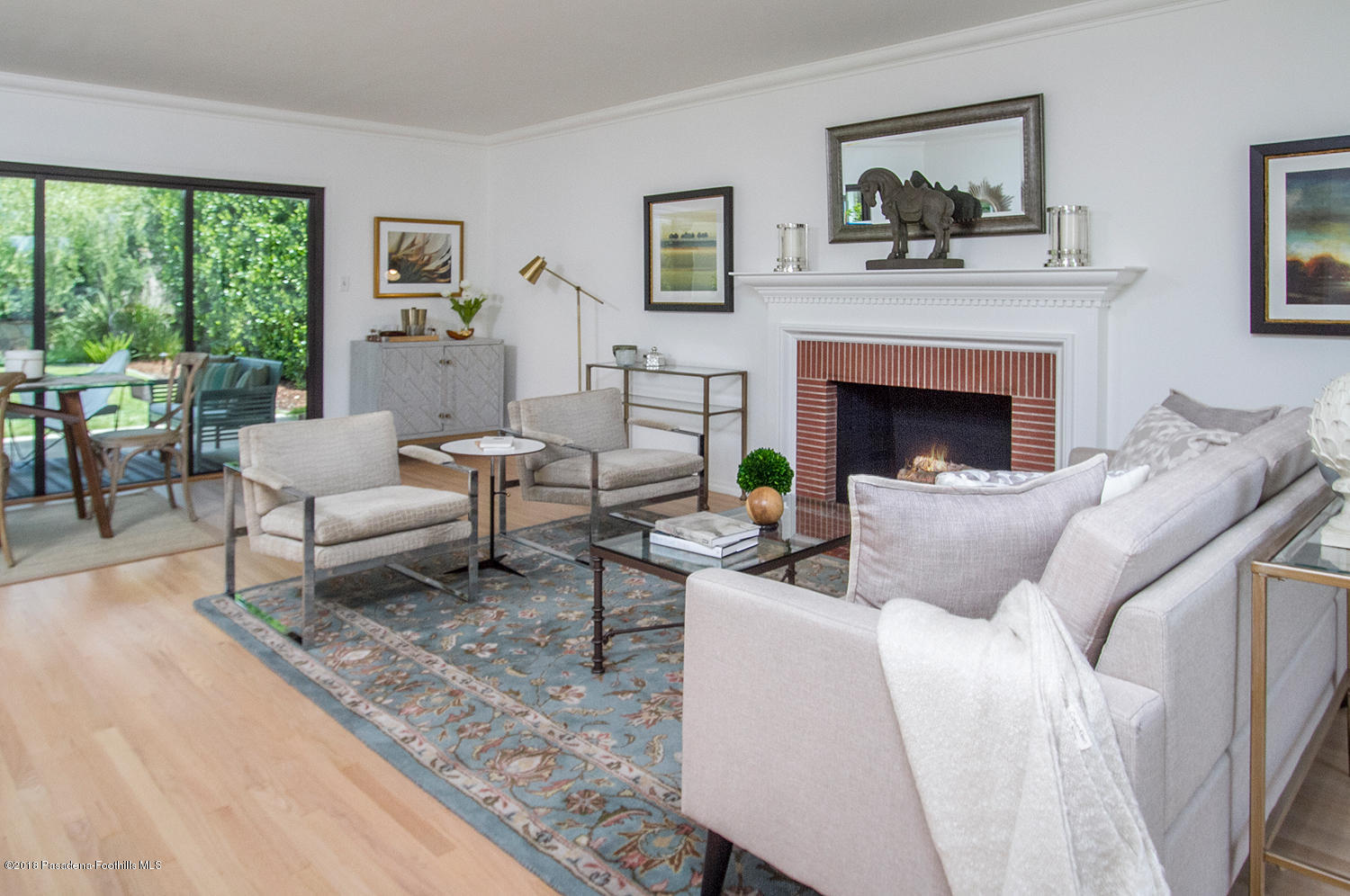 3675 Greenhill Road Pasadena, CA 91107 - Photo 4 of 27 a living room with furniture and a fireplace