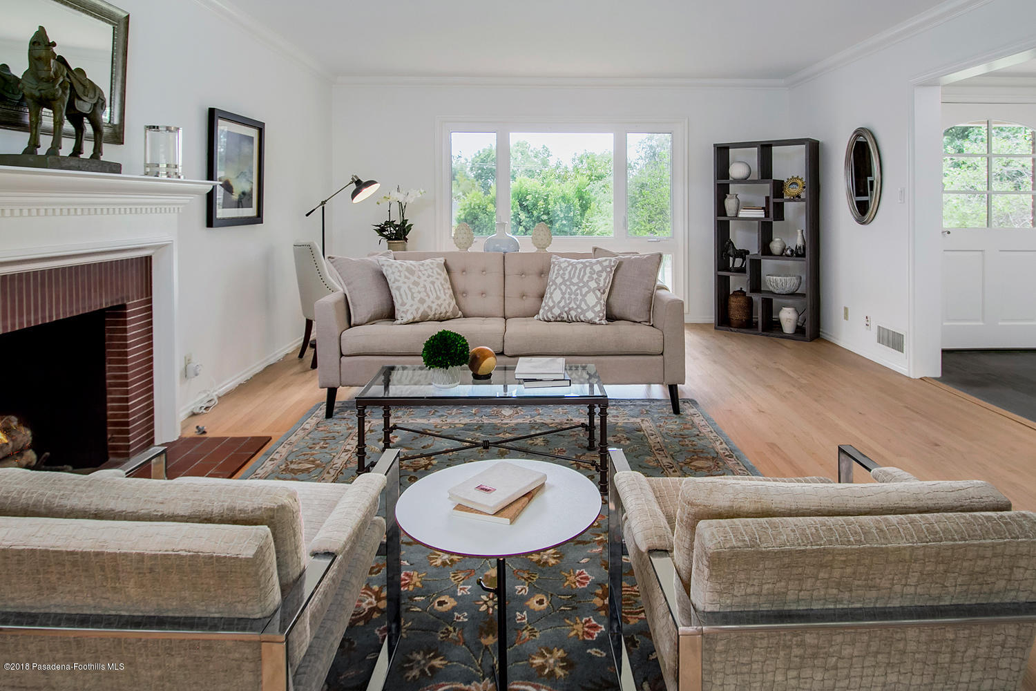 3675 Greenhill Road Pasadena, CA 91107 - Photo 5 of 27 a living room with furniture and a fireplace