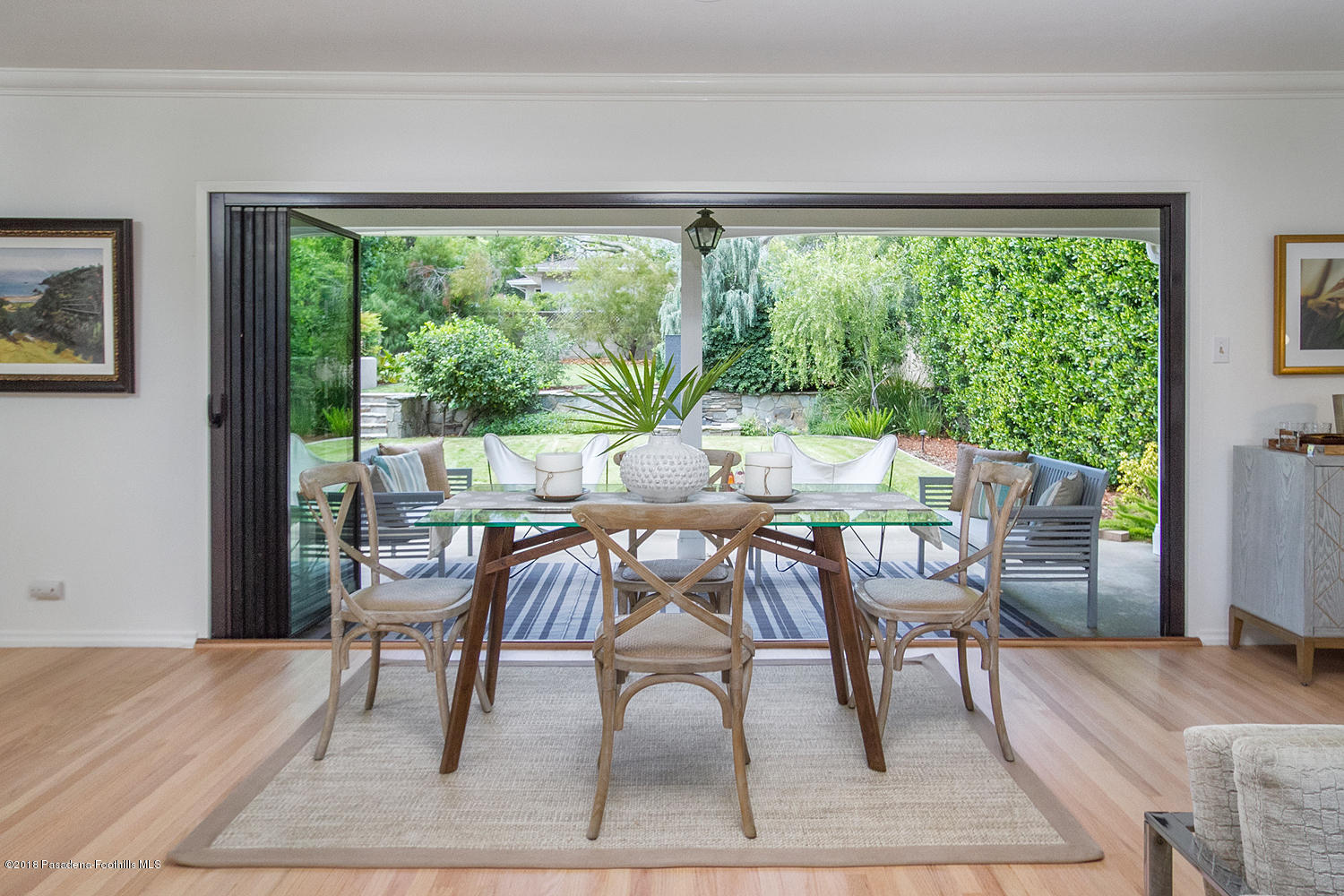 3675 Greenhill Road Pasadena, CA 91107 - Photo 7 of 27 a dining room with furniture and a floor to ceiling window