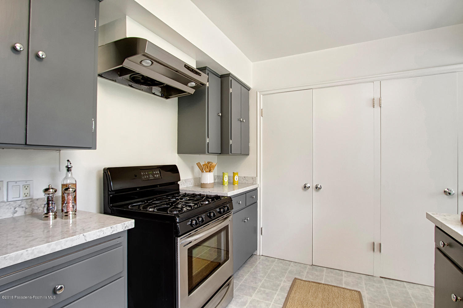 3675 Greenhill Road Pasadena, CA 91107 - Photo 9 of 27 a kitchen with a stove and a refrigerator