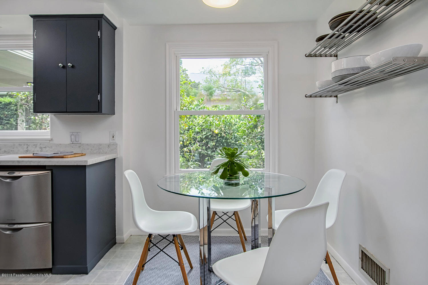 3675 Greenhill Road Pasadena, CA 91107 - Photo 10 of 27 a dining room with furniture and window