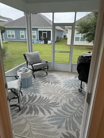 a bathroom with a granite countertop double vanity sink mirror and shower