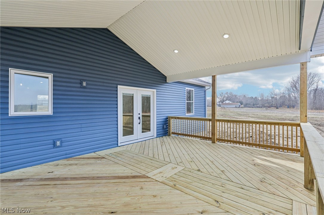 6535 North Ridge Road West Geneva, OH 44041 - Photo 40 of 48 Deck with french doors